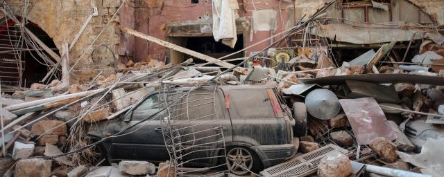 Rubble and debris sit on a damaged automobile on a residential street in Beirut, Lebanon, on Wednesday, Aug. 5.